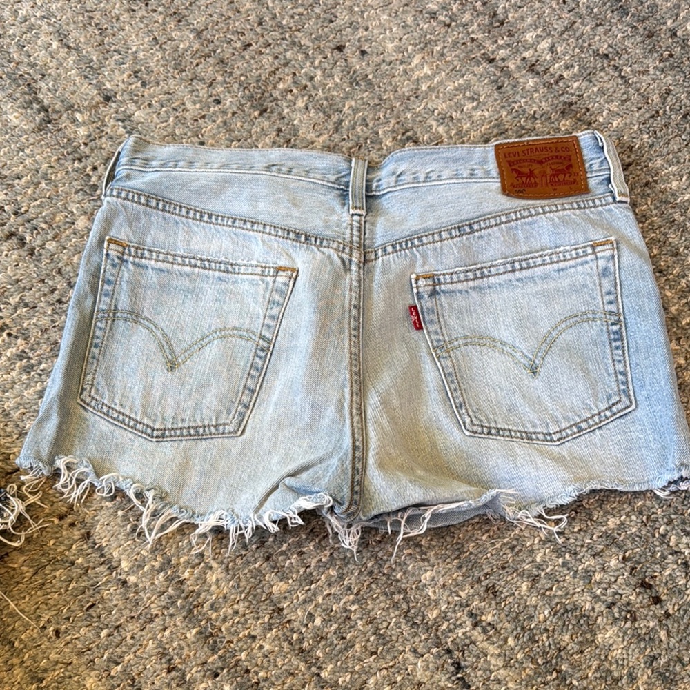 Levi's Light Wash Denim Frayed Hem Cutoff Shorts
